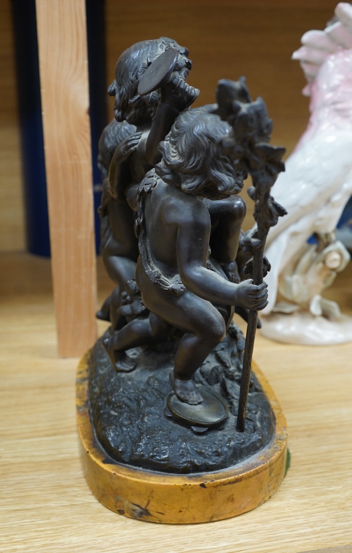 After Claude Michel Clodion (1738-1814), a bronze group of three Bacchanalian cherubs on sienna marble base, 31cm. Condition - fair to good